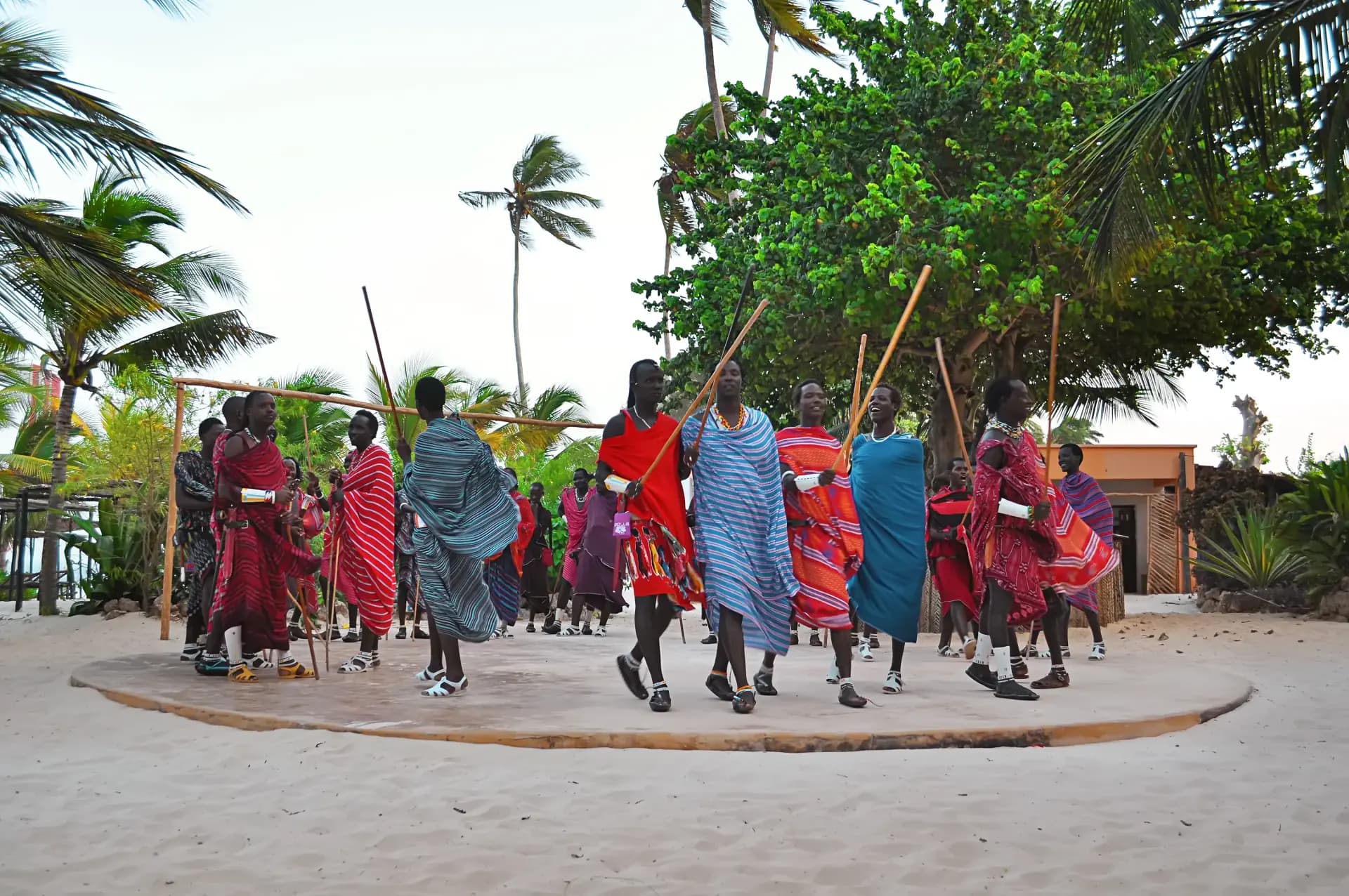 Maasai warriors performing traditional dance in the savanna